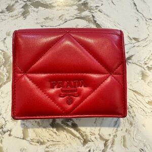 Prada, authentic European exclusive wallet. Like new, with authenticity card.